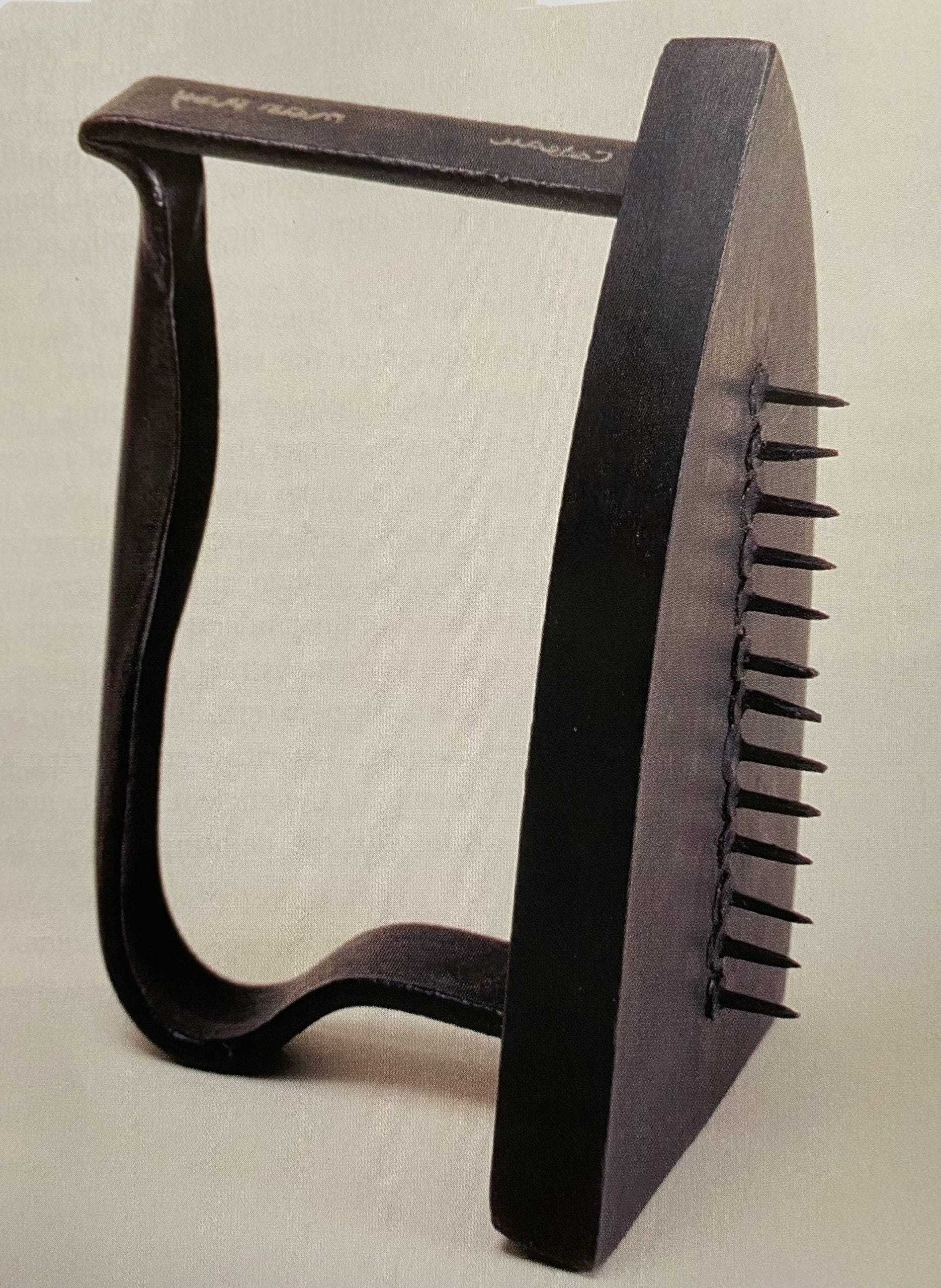 Cadeau (The-Gift) sculpture by Man Ray
